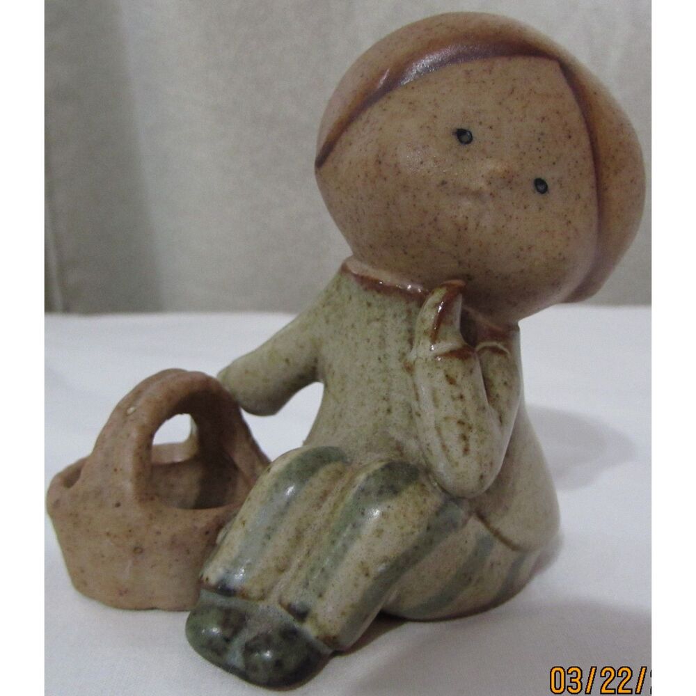 UCTCI vintage stoneware girl figurine art pottery thinking pose with basket